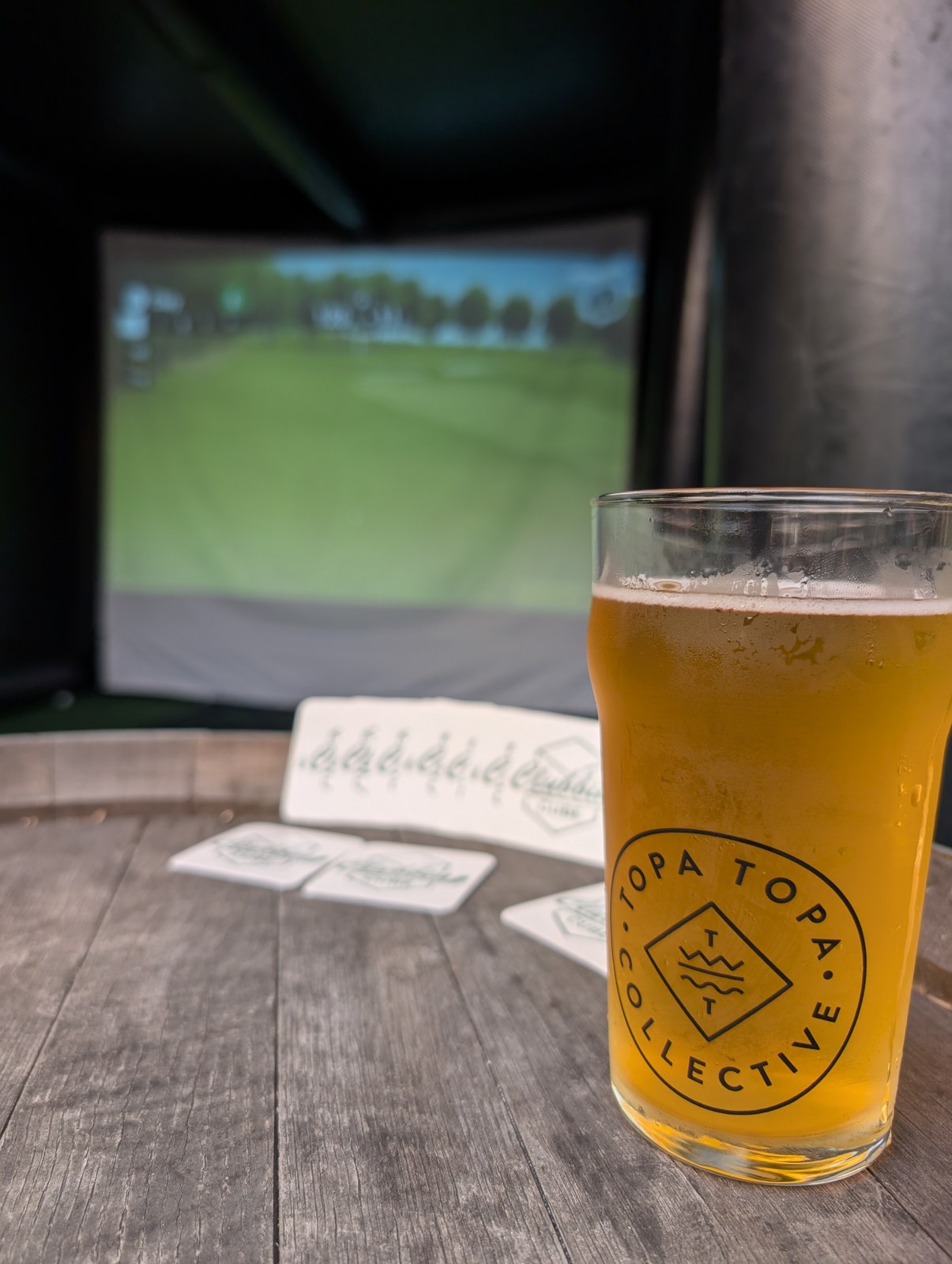 Topa Topa Collective glass on a patio barrel with the Clubbin Cube beyond